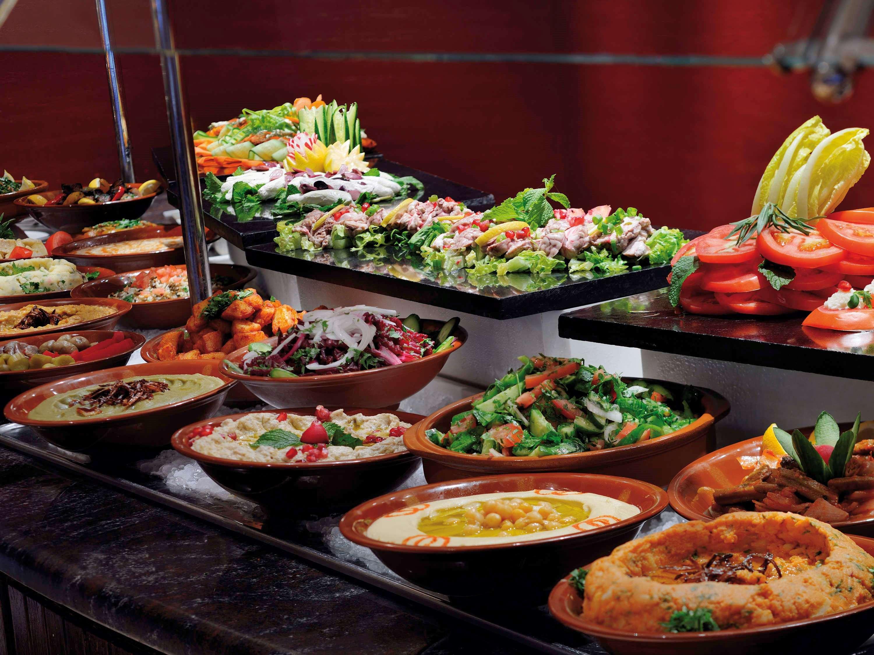 Moevenpick Hotel & Resort Al Bida'A Salmiya Exterior photo A selection of Middle Eastern cuisine