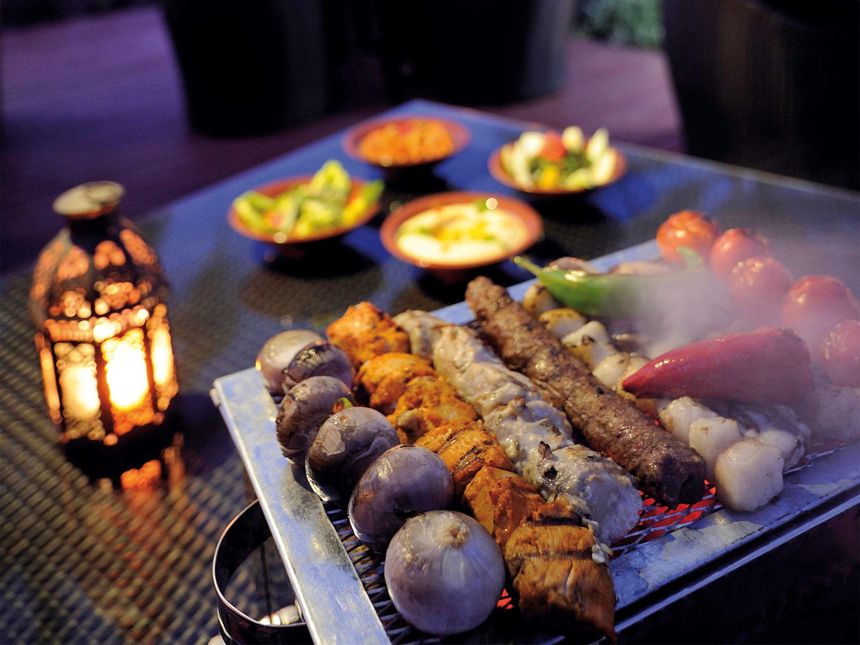 Moevenpick Hotel & Resort Al Bida'A Salmiya Exterior photo A selection of kebabs