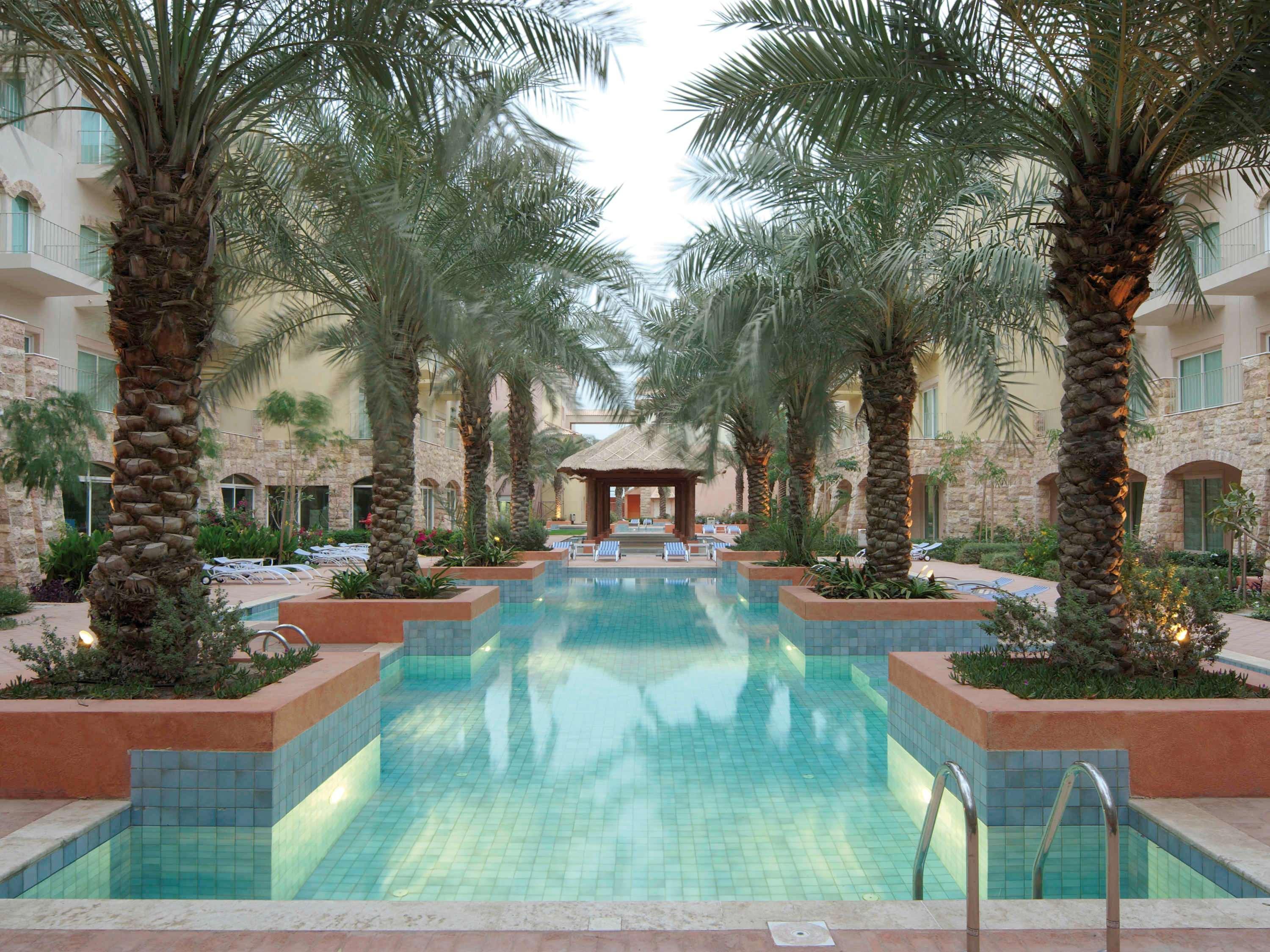 Moevenpick Hotel & Resort Al Bida'A Salmiya Exterior photo The pool at the Ritz-Carlton, Dubai