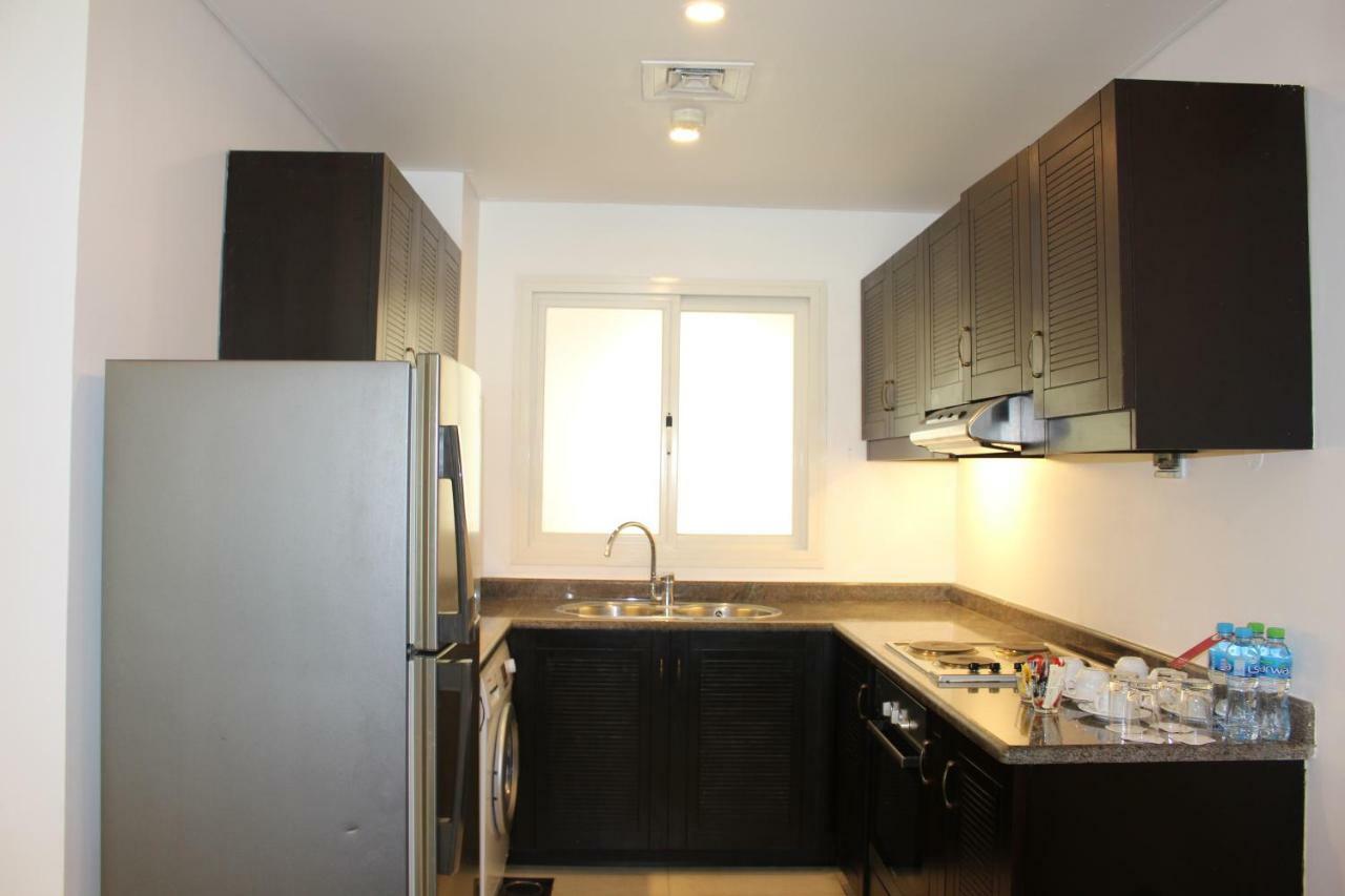 Moevenpick Hotel & Resort Al Bida'A Salmiya Exterior photo A typical kitchen in a residential apartment